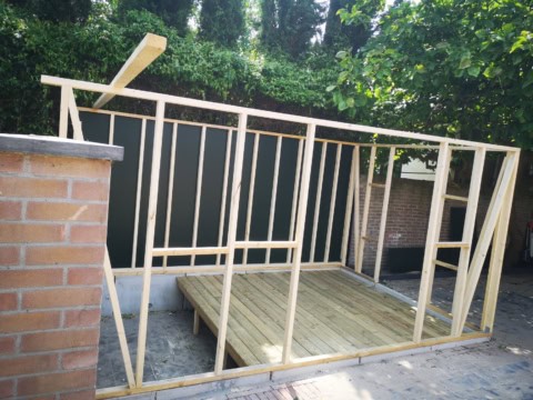 image showing some wood being layered like a shed for custom woodwork